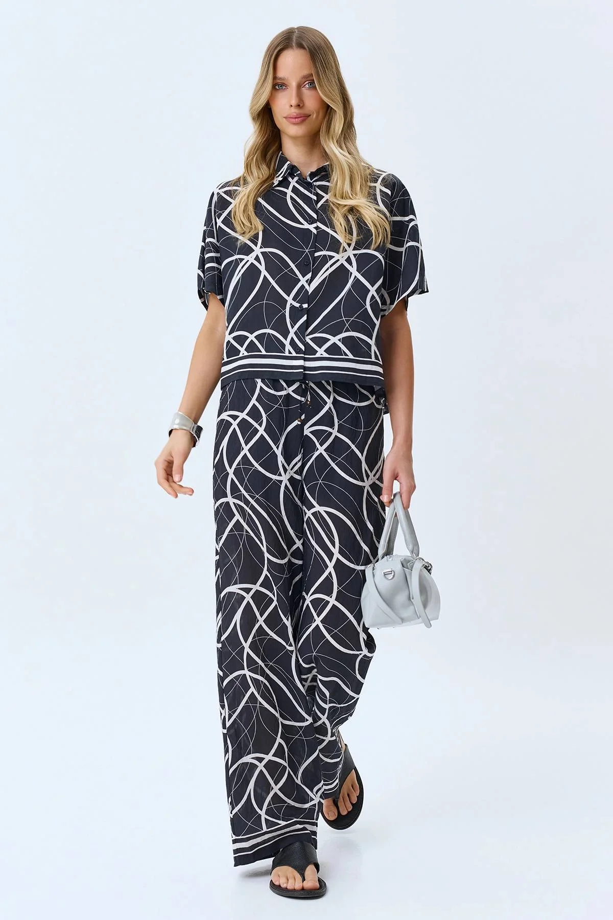 Брюки с абстрактным принтом, 44