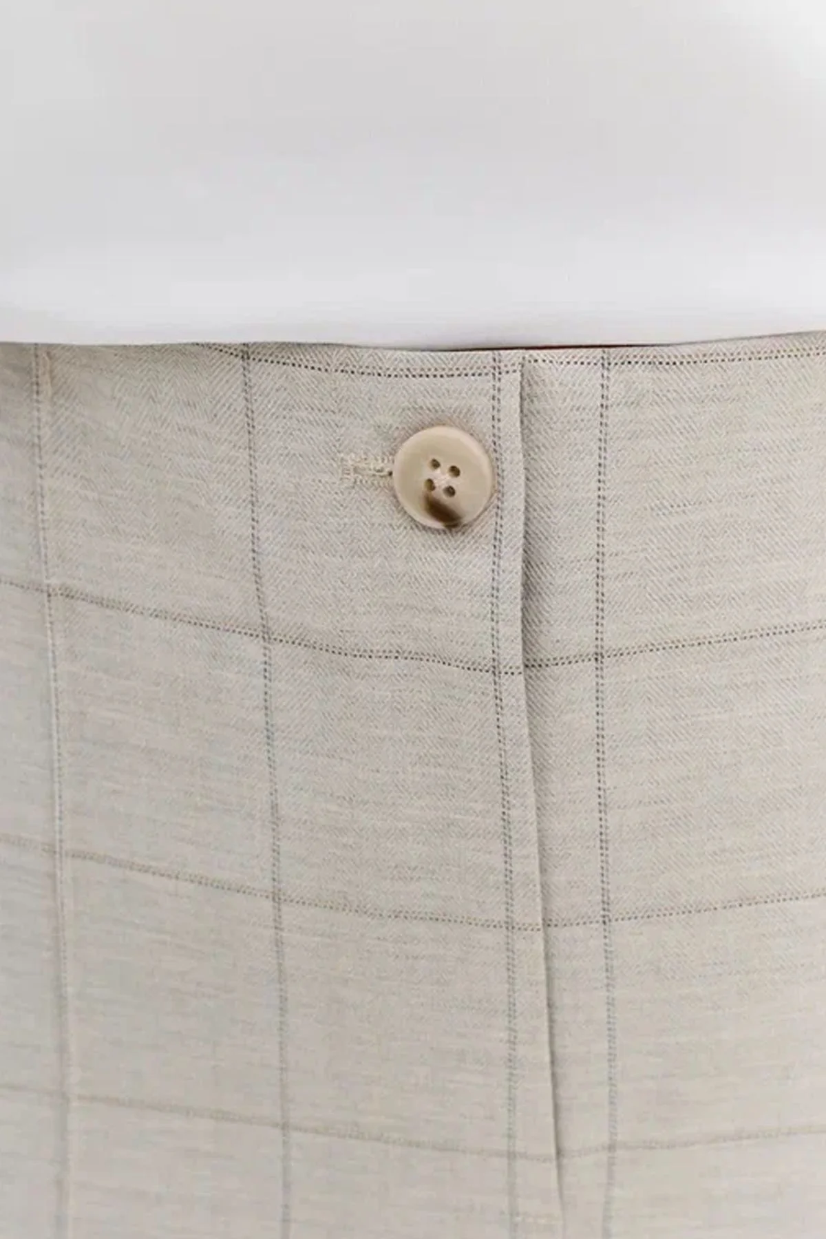 Брюки светло-серого цвета в клетку с застроченными стрелками, 52р