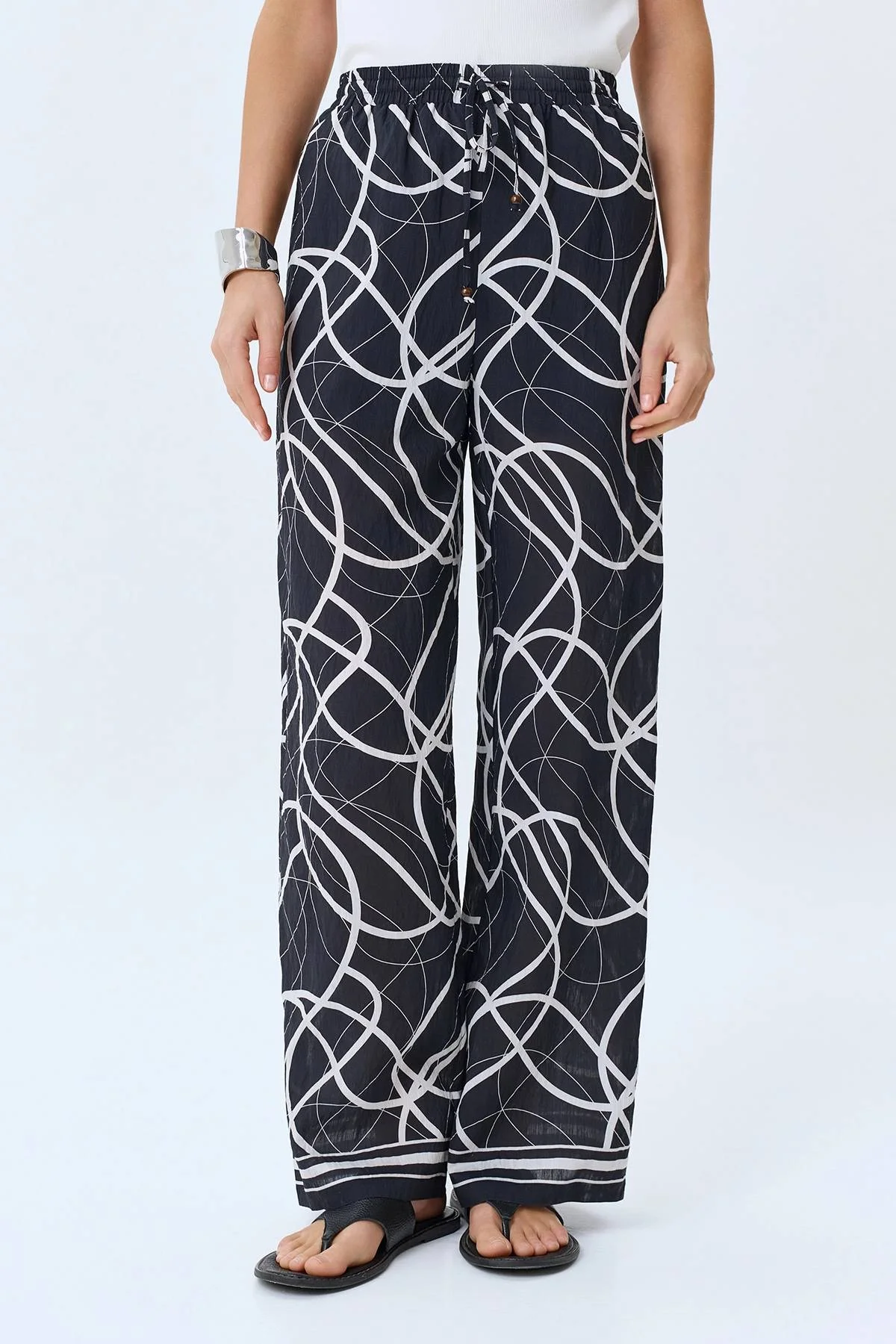 Брюки с абстрактным принтом, 42