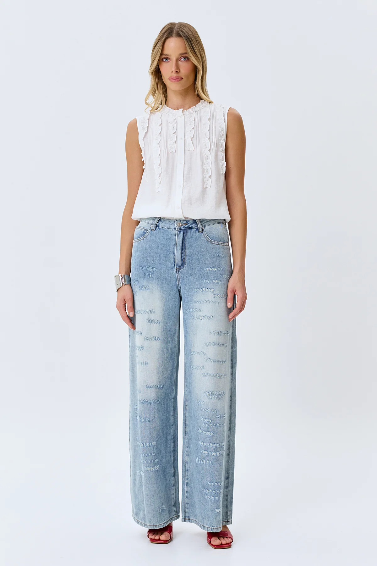 Широкие джинсы с акцентными дестроями, 44