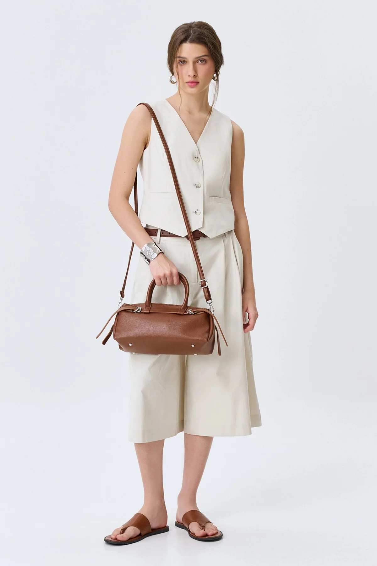 Сумка-багет с декоративными ремешками, One