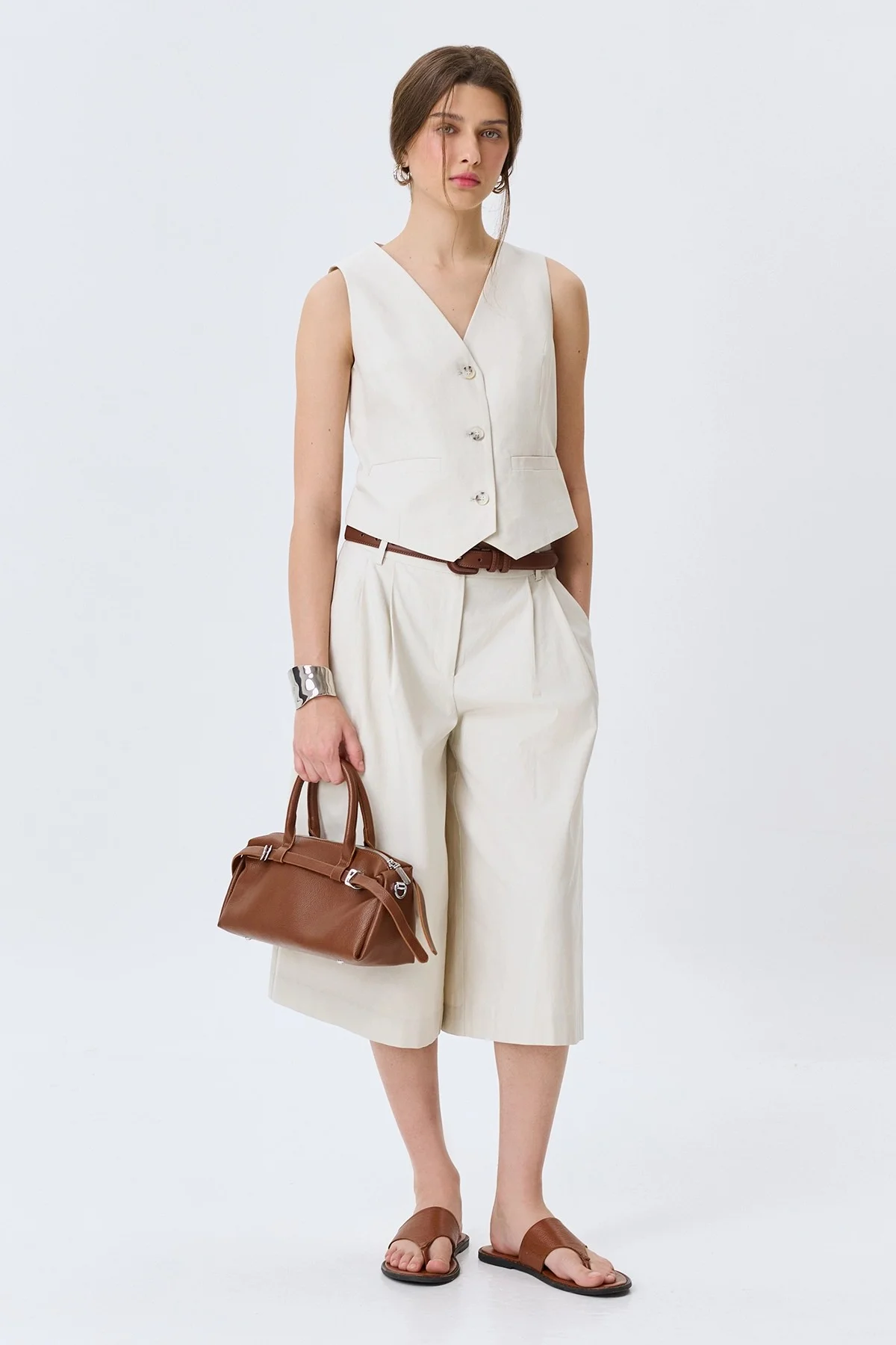 Сумка-багет с декоративными ремешками, One