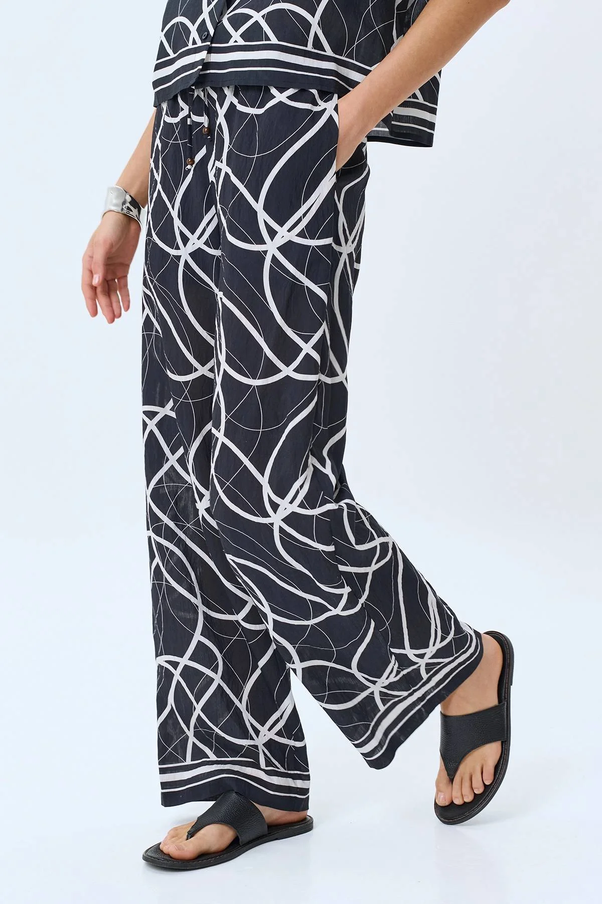 Брюки с абстрактным принтом, 42