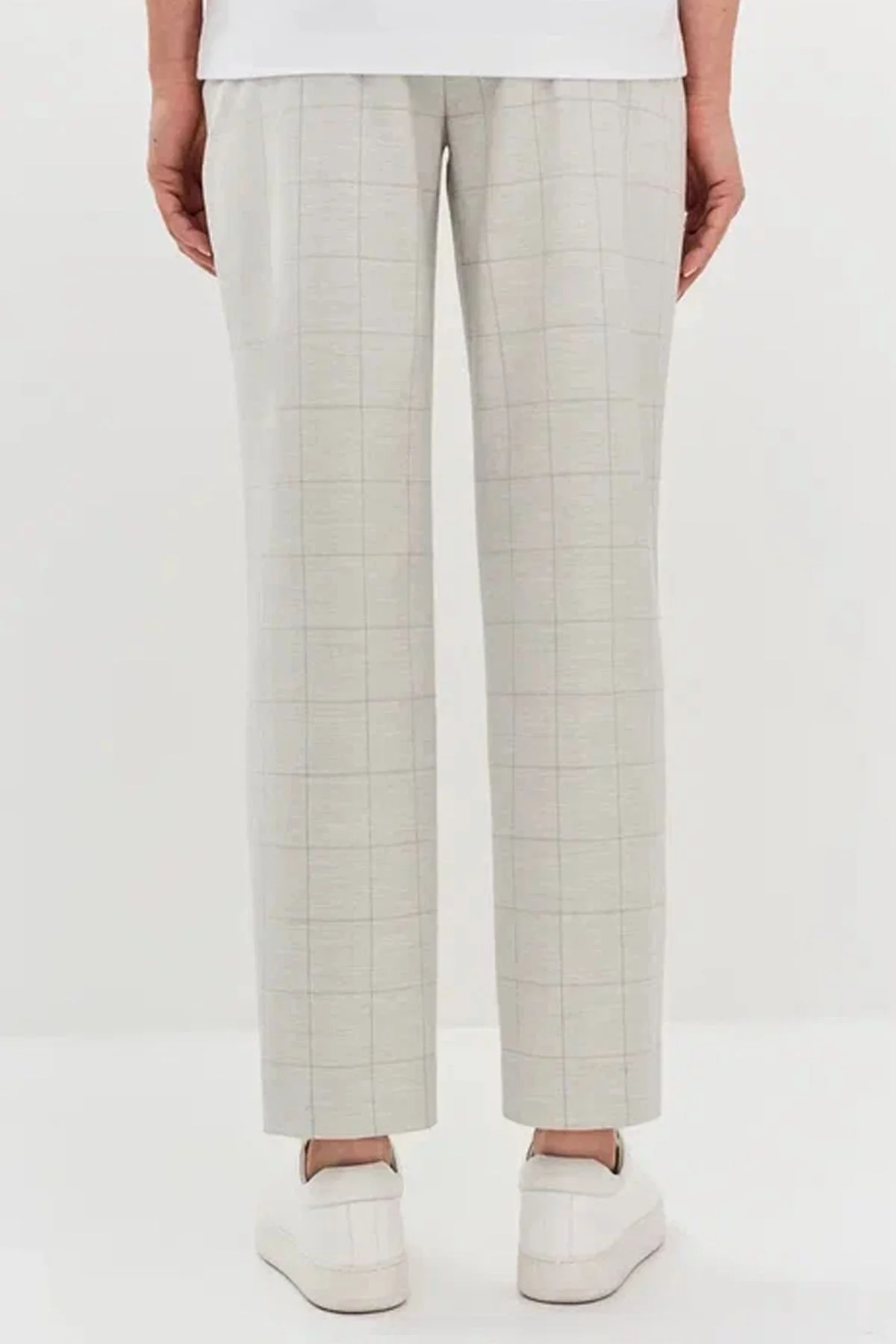 Брюки светло-серого цвета в клетку с застроченными стрелками, 52р