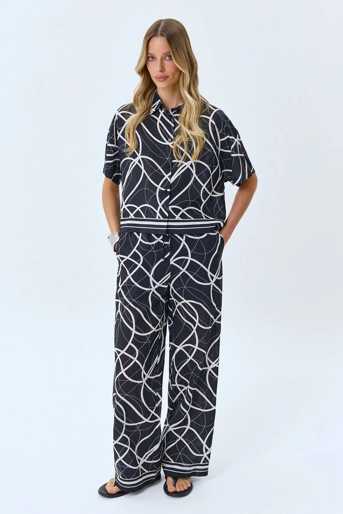 Брюки с абстрактным принтом, 42