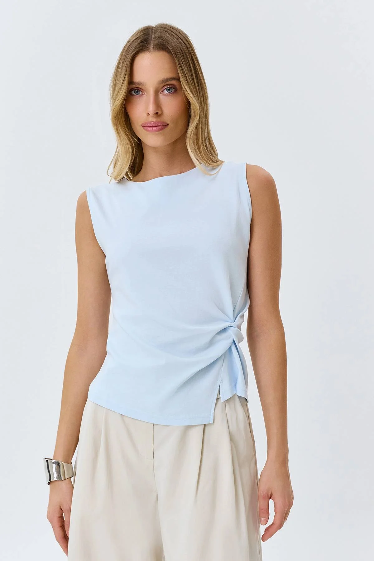 Топ с асимметричными складками, 52