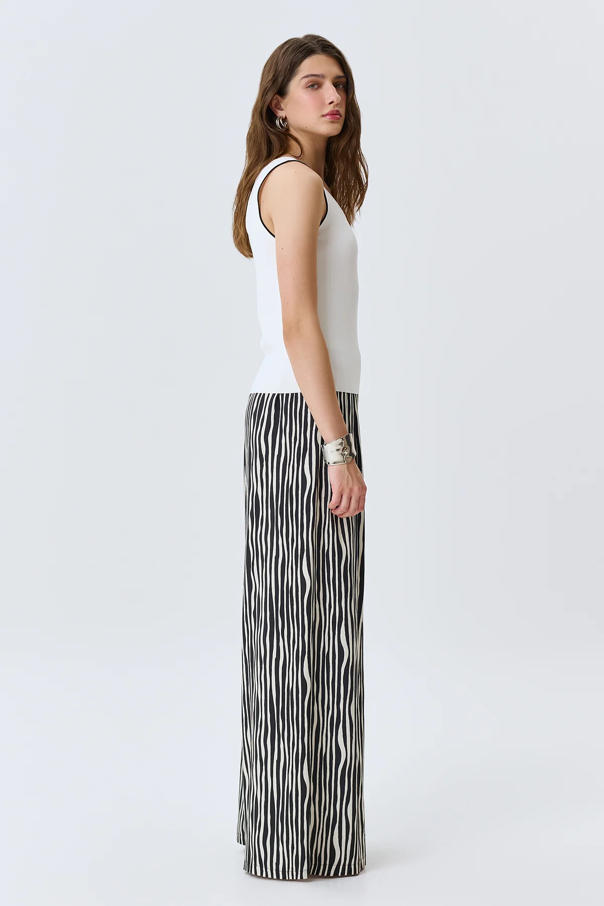 Брюки в монохромную полоску, 42