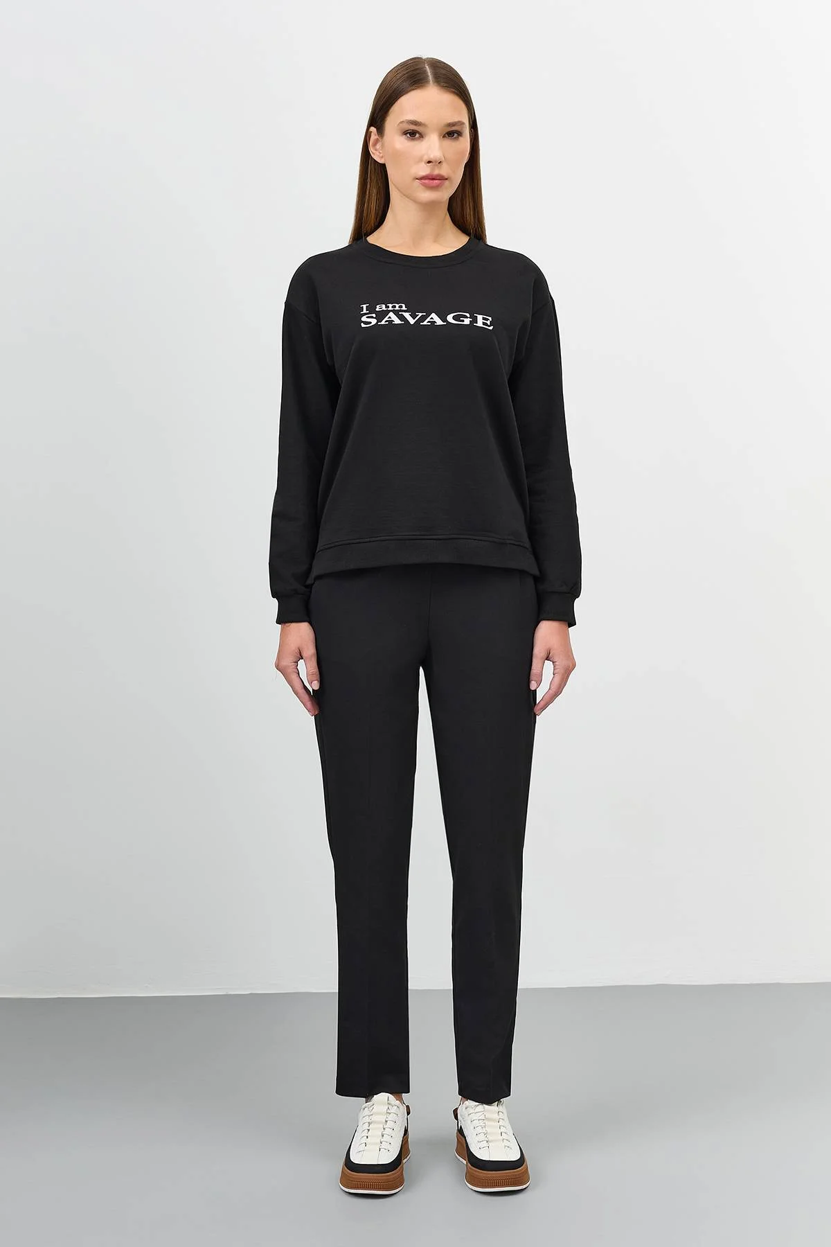 Черные брюки с карманами, 52