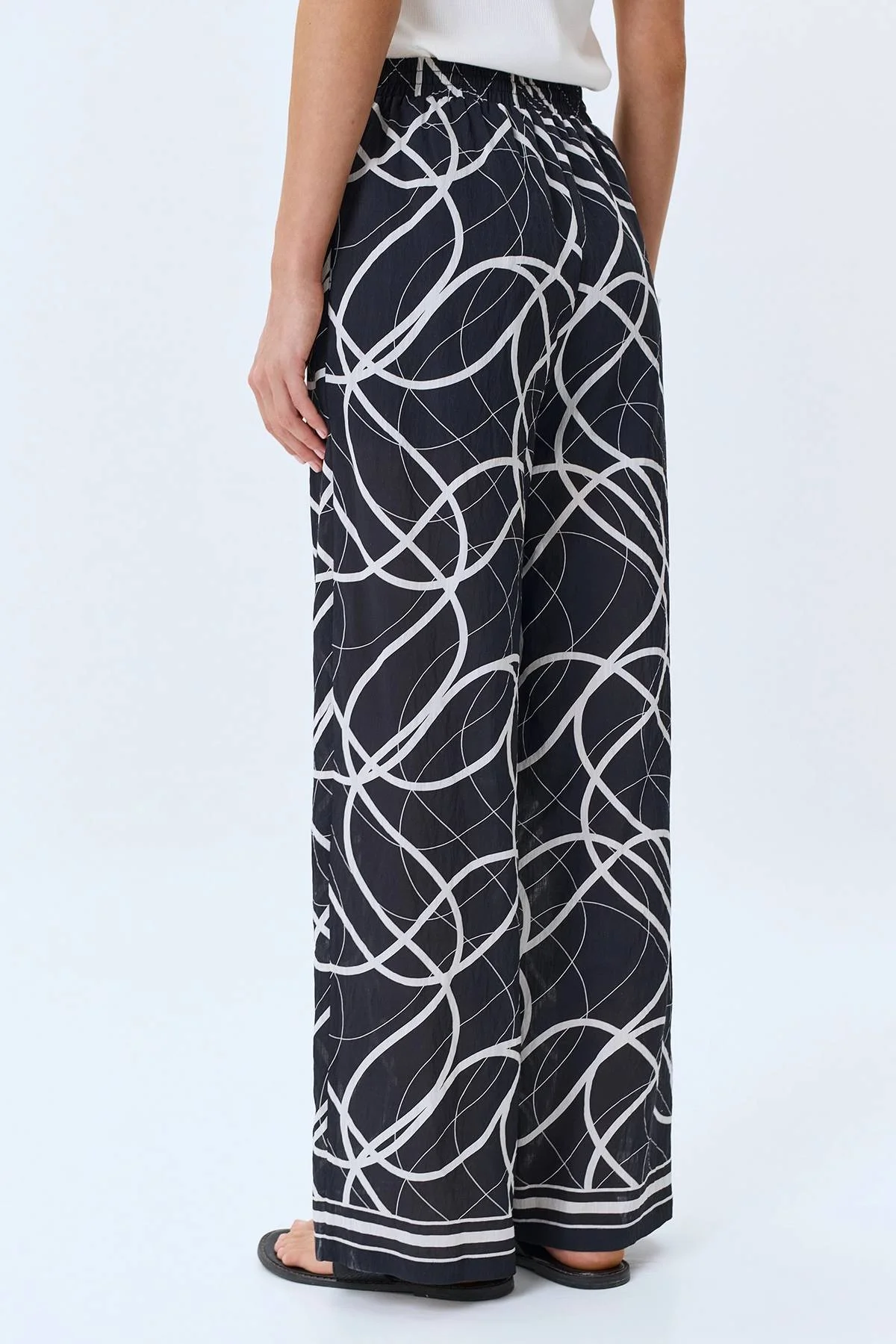 Брюки с абстрактным принтом, 44