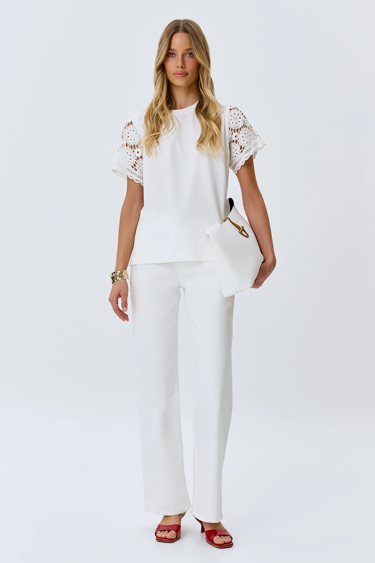 Белые джинсы с вышивкой и цветной фурнитурой, 48