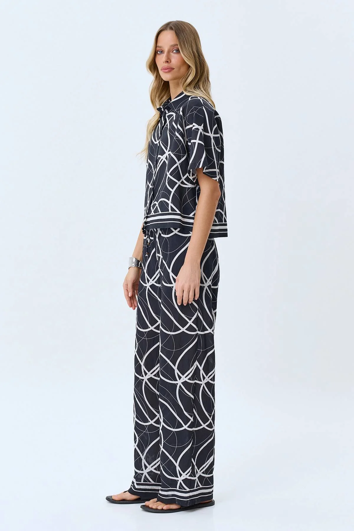 Брюки с абстрактным принтом, 42