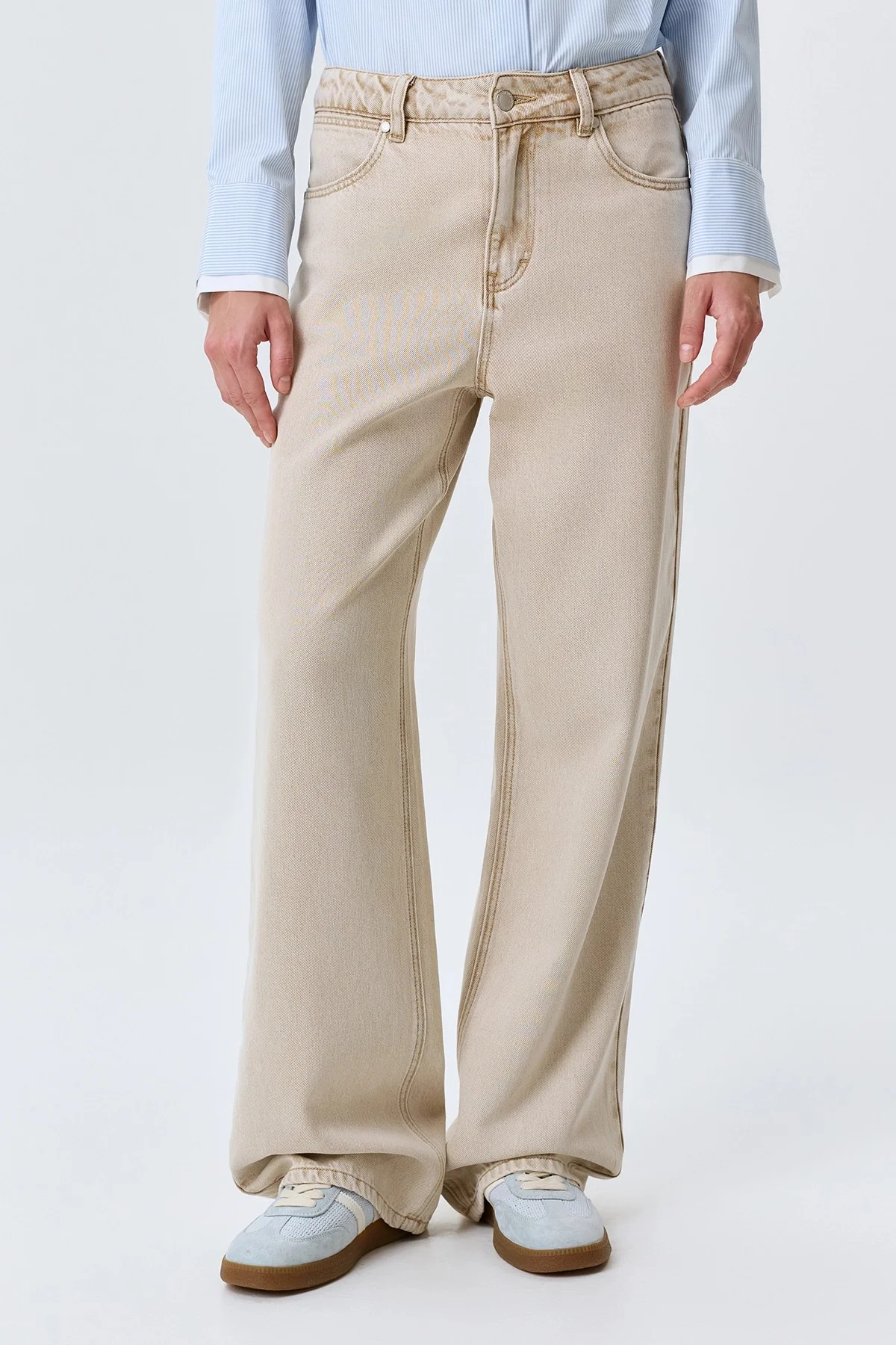 Бежевые джинсы с деликатной варкой, 52