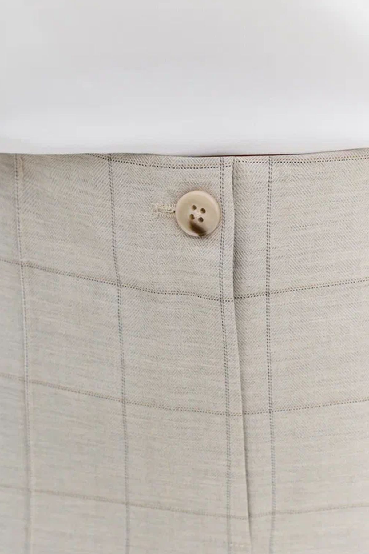 Брюки светло-серого цвета в клетку с застроченными стрелками, 52р