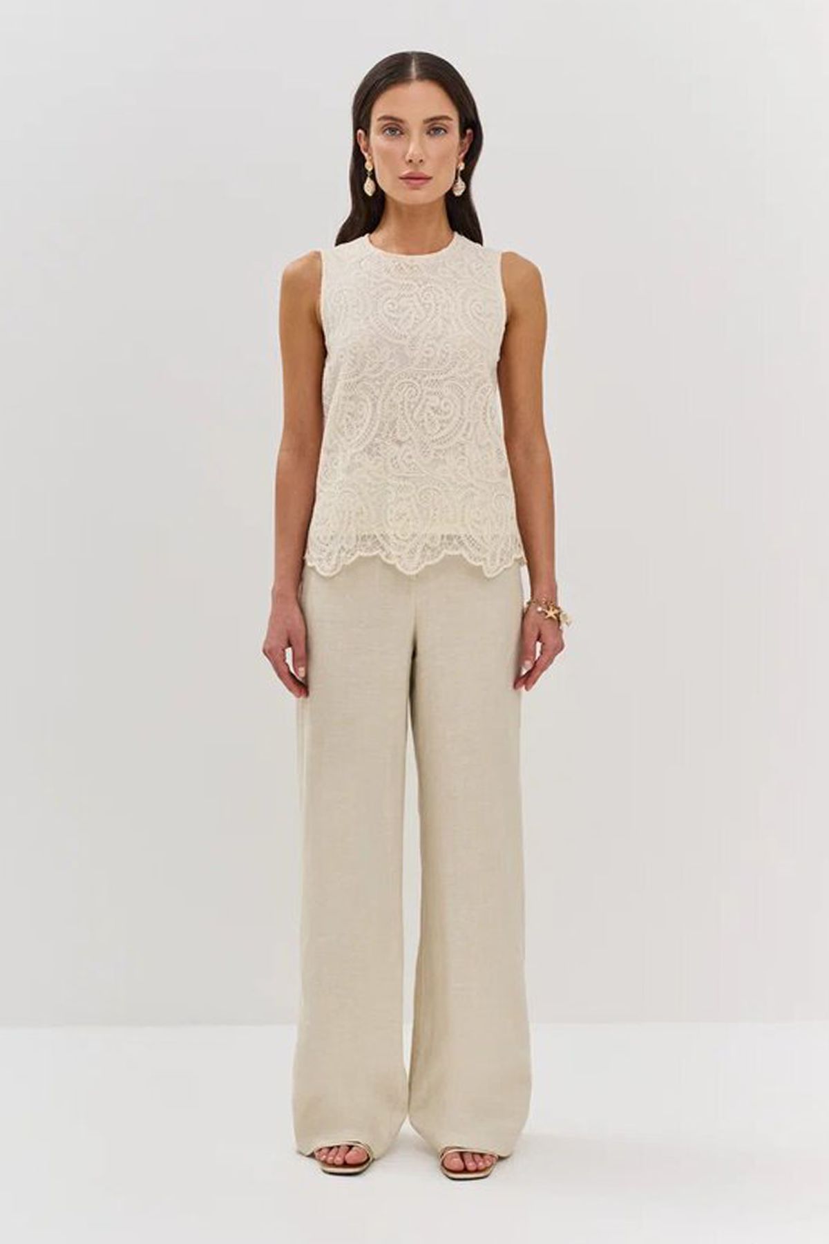 Льняные брюки с брендированной вышивкой, 42р