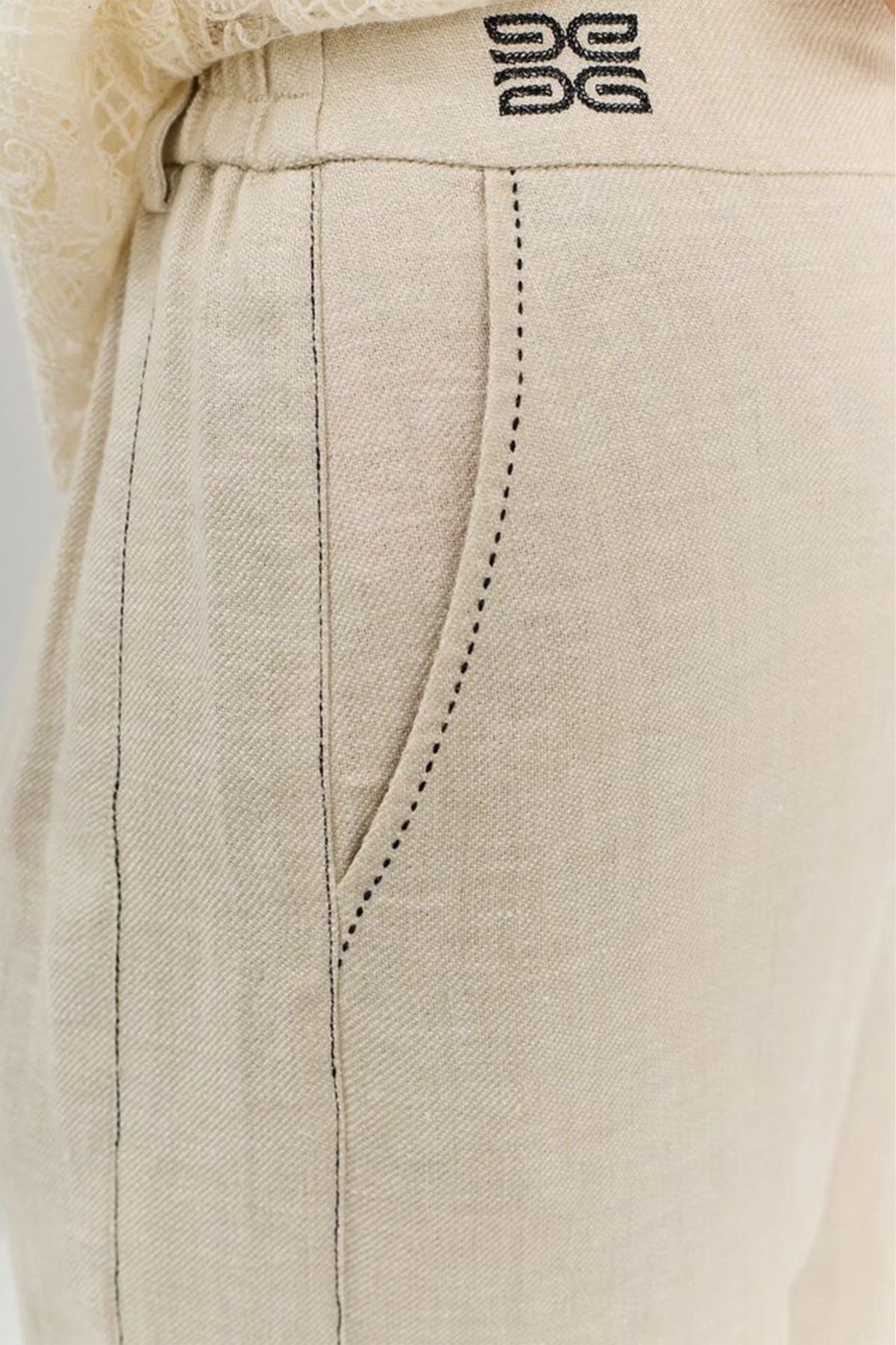 Льняные брюки с брендированной вышивкой, 44р