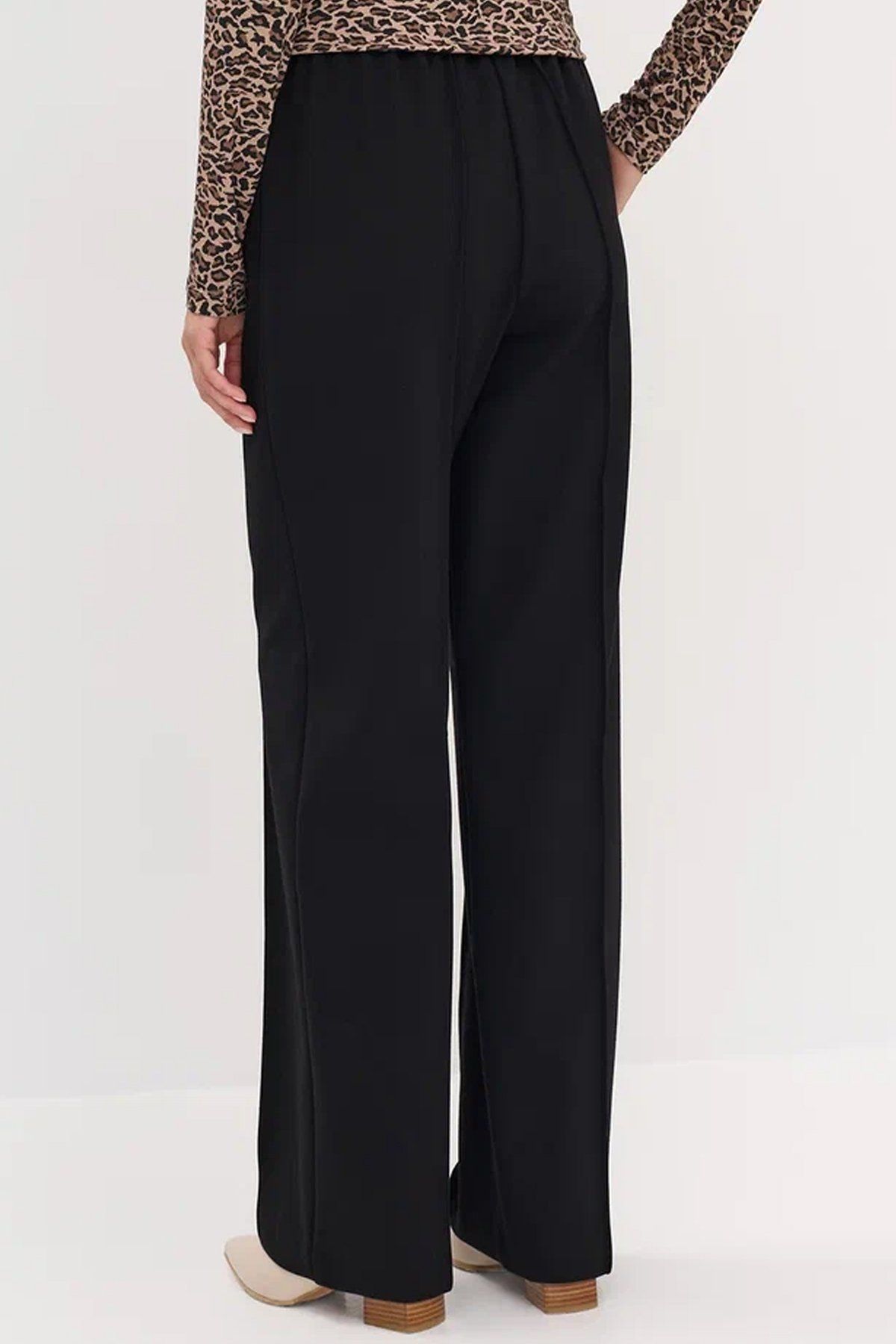 Чёрные однотонные брюки с отстроченными стрелками, 46р