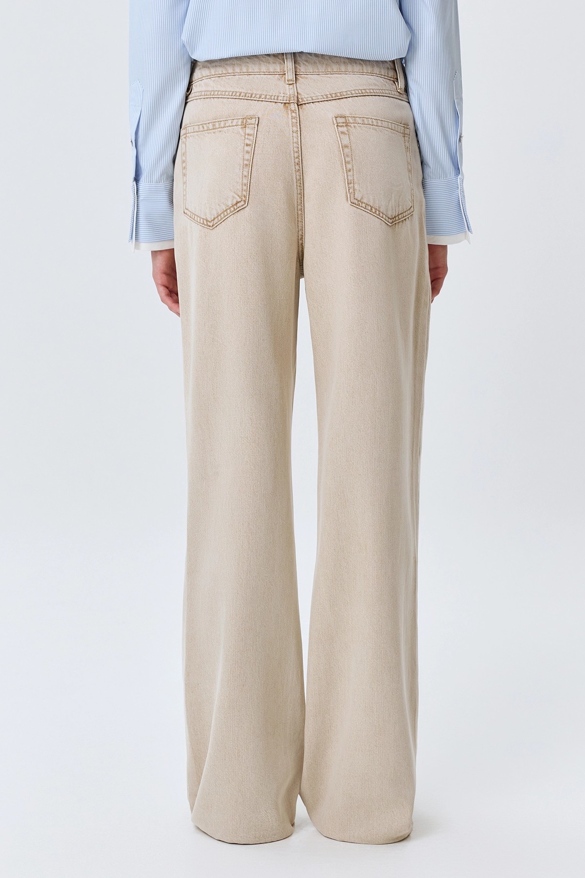 Бежевые джинсы с деликатной варкой, 50