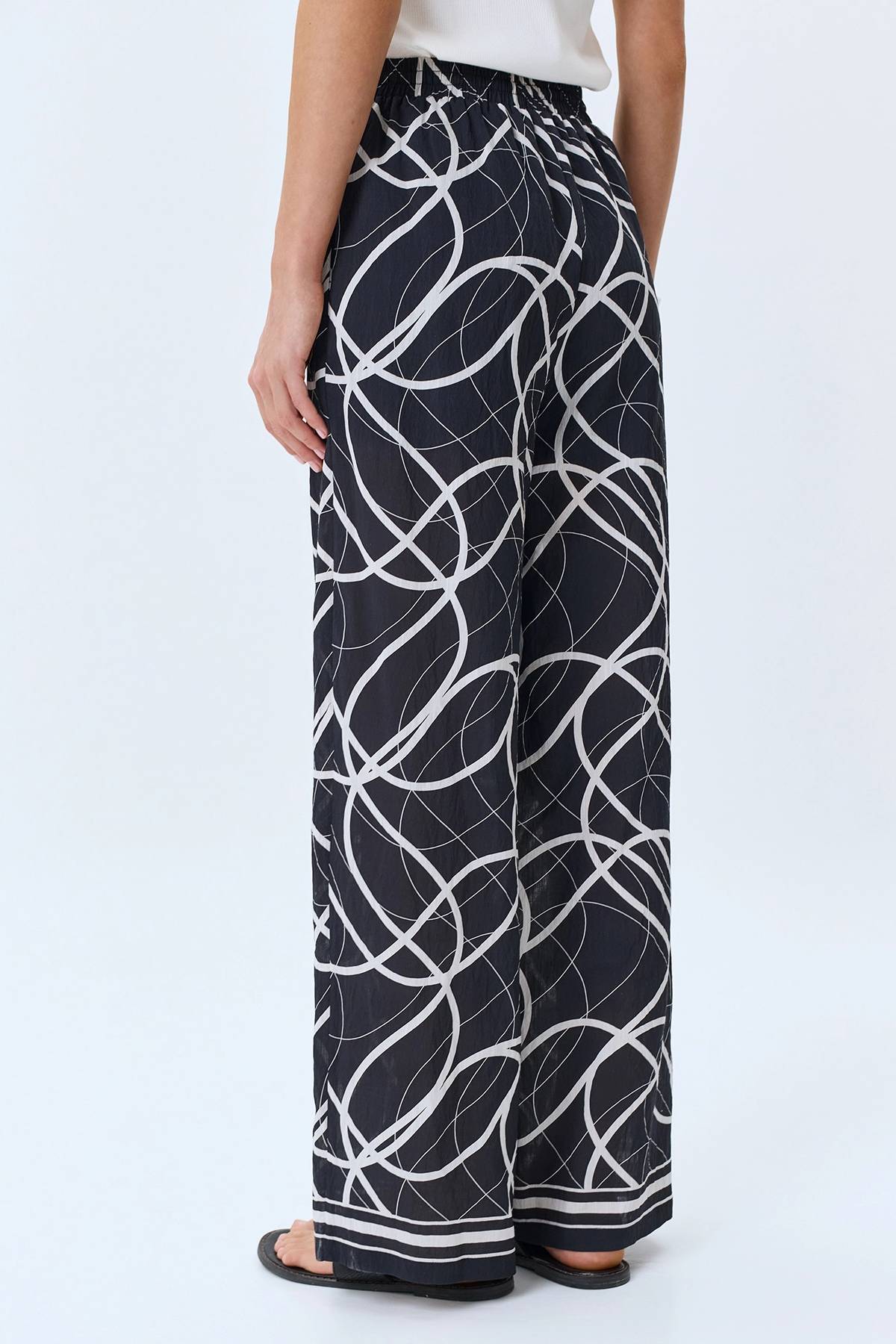 Брюки с абстрактным принтом, 44