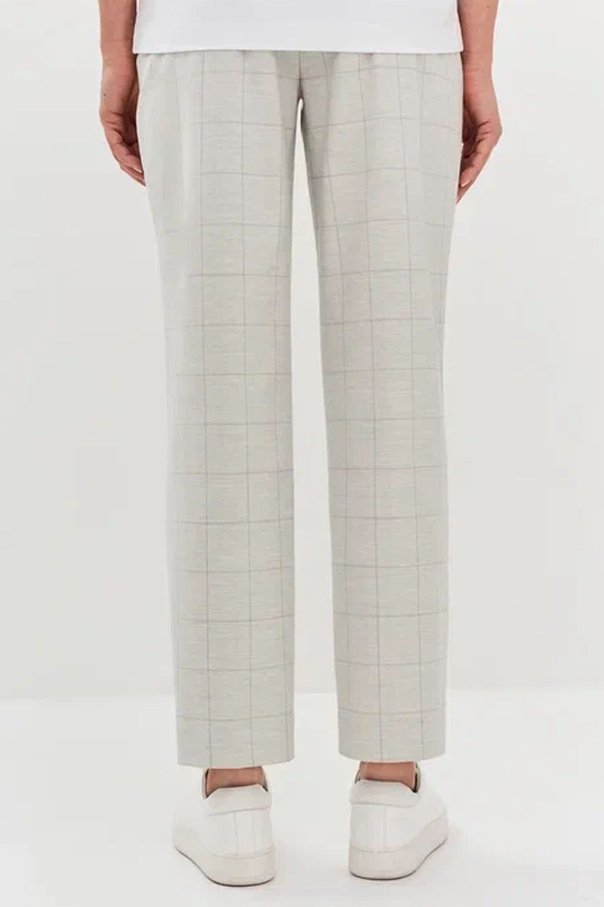 Брюки светло-серого цвета в клетку с застроченными стрелками, 42р