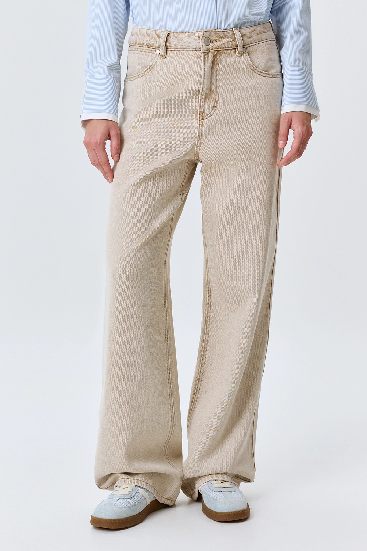 Бежевые джинсы с деликатной варкой, 52